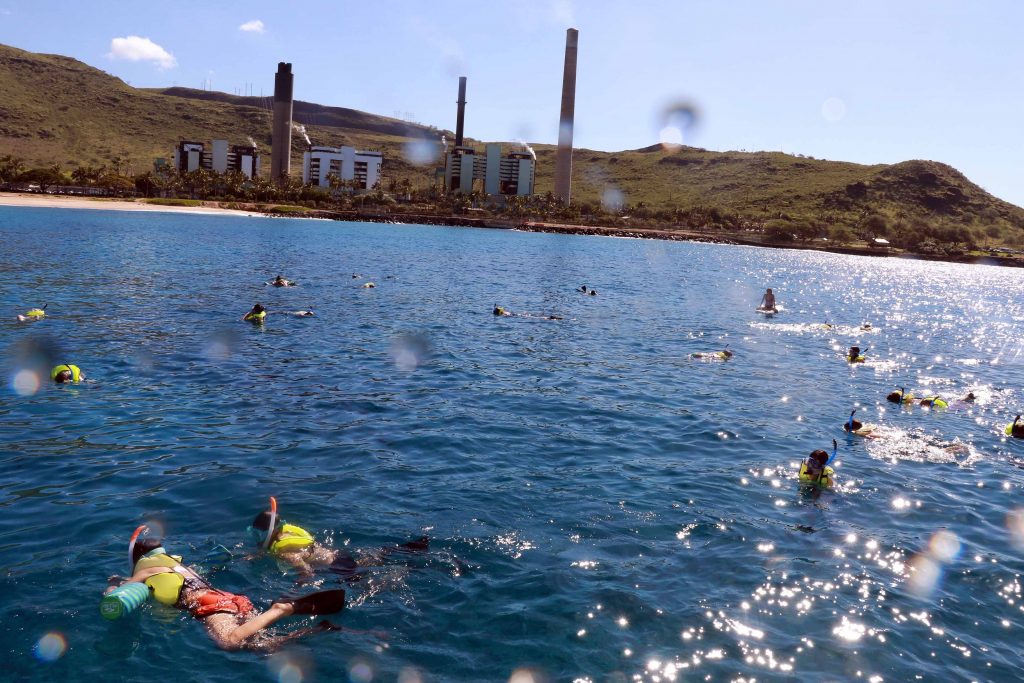 Snorkeling at Electric Beach on Oahu. 