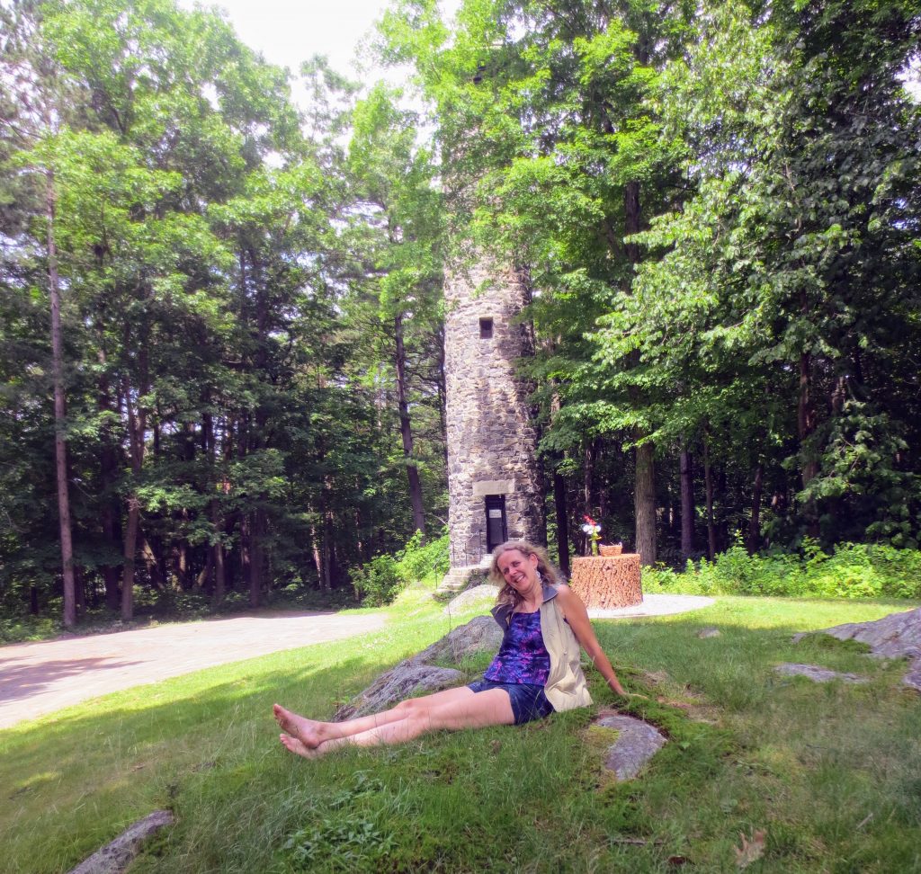 Karen in front of Bartlett Tower in Hanover, New Hampshire. I didn't start yoga yet, but at least I got out to scavenger hunt by finding geocaches.