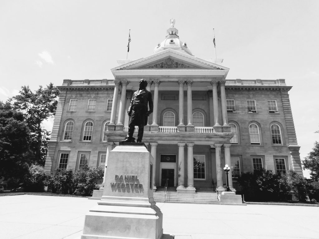 NH state house in black and white. The start of our travel bucket list