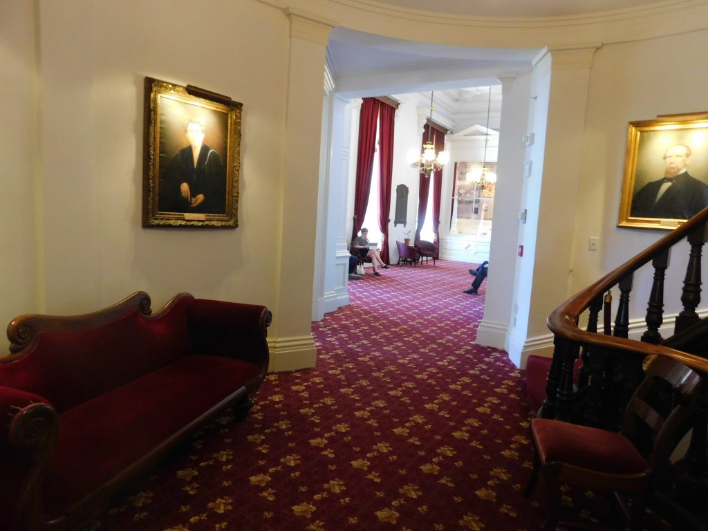 Inside the Vermont State House, fancy furniture and carpeting