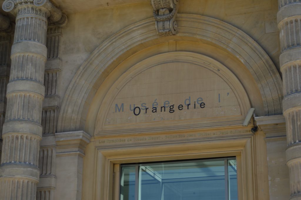 Free entry to l'Orangerie. The front door with Orangerie sign on it.