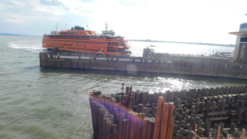 Staten Island ferry leaving the dock. A great way to see the Statue of Liberty for free.