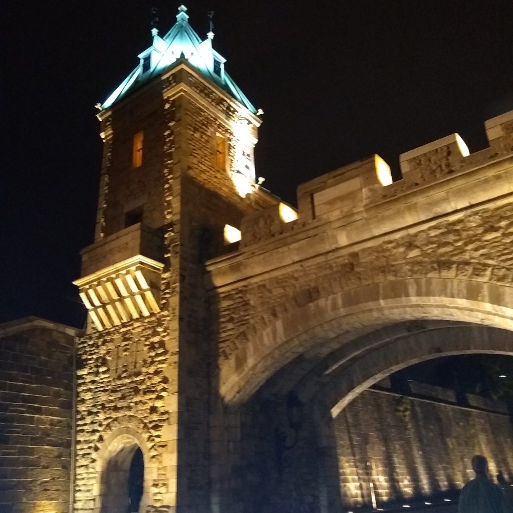 One of Quebec City's gates by night. Not only can you watch whales out of Quebec City, in addition there is tons of history to explore.