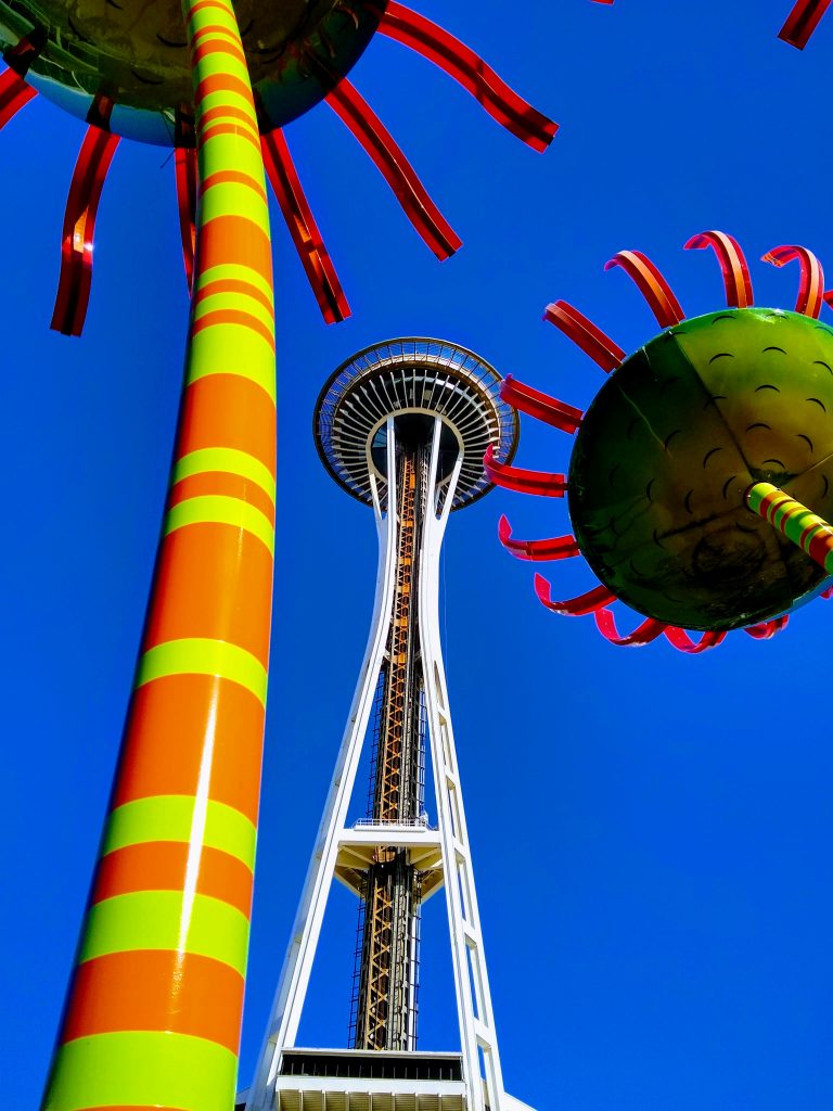 Space needle and giant flowers.