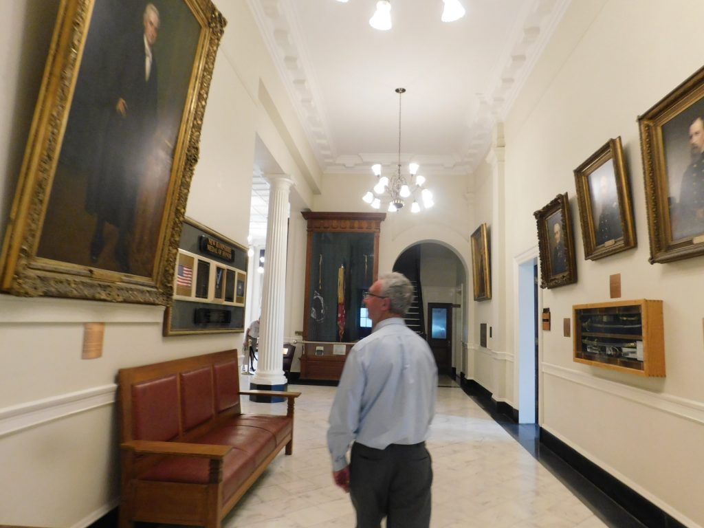 State house hallway with paintings. Make sure to take a tour of the NH state house