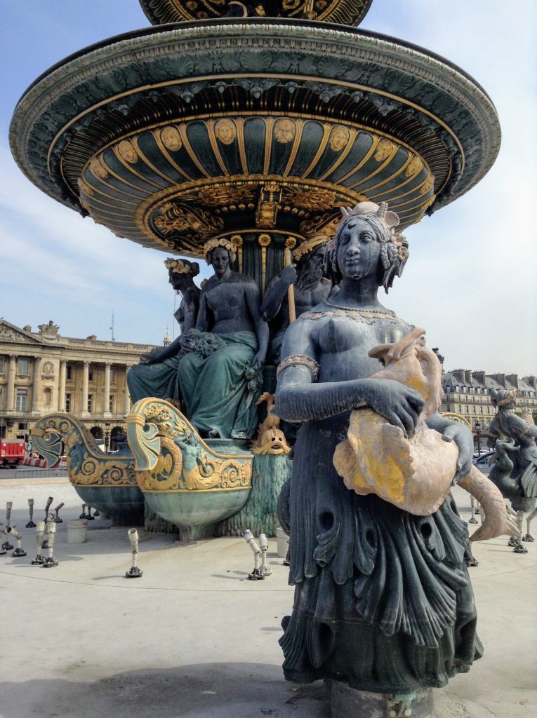 Sculpture in Paris. Explore the city instead of beating the shell game! 
It's a tourist scam. 