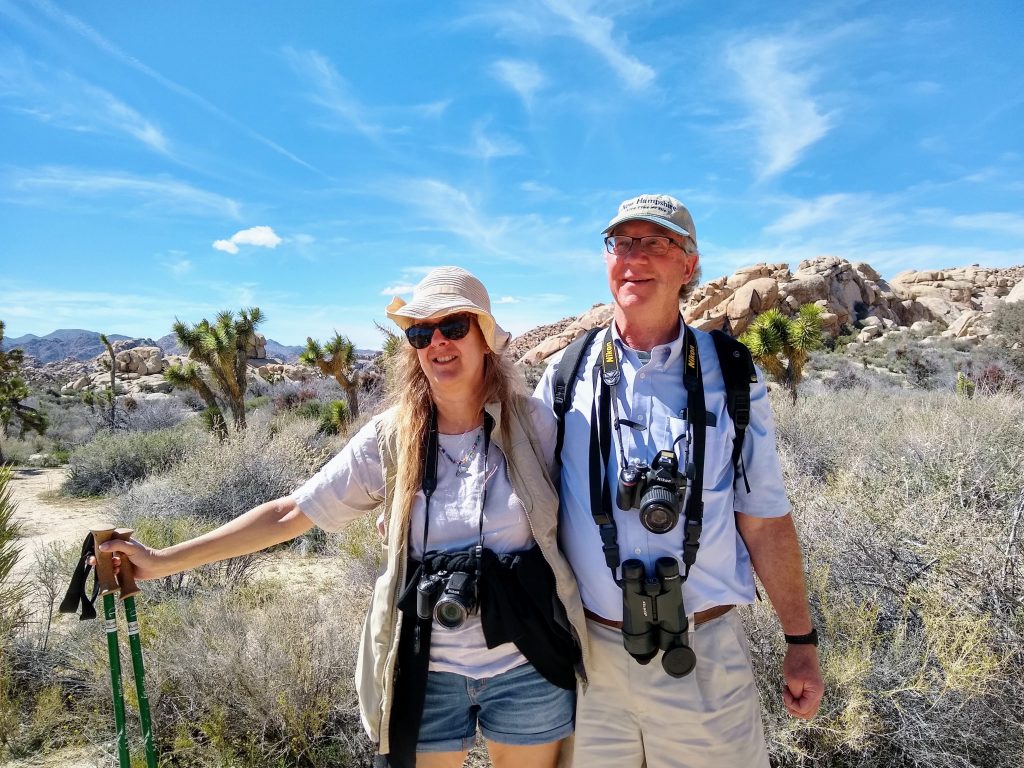 Karen and Tom in Joshua tree National Park with trees and mountains in the background. That hike definitely was an MS challenge