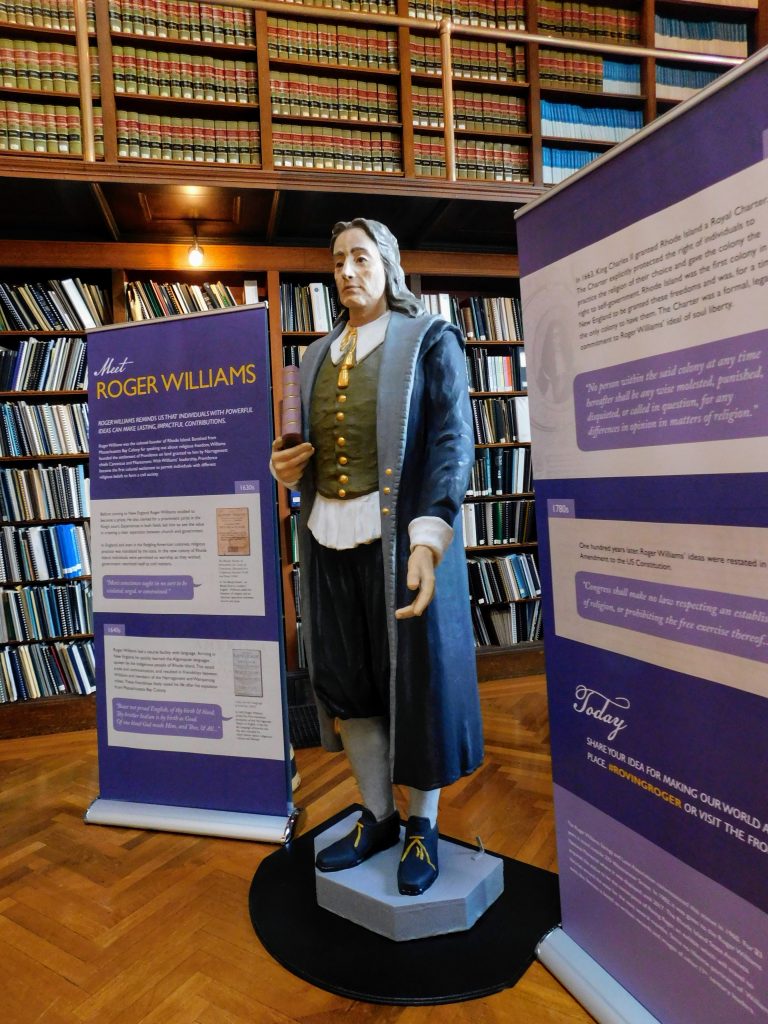 Full size statue of Roger Williams in the Rhode Island State House library