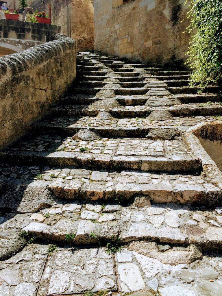 Stairs going up in the town of Matera. Very cool looking. 