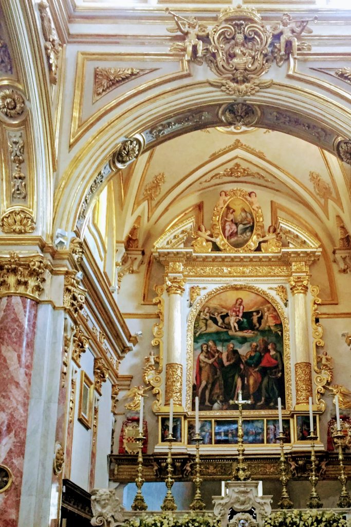 Altar and mural inside one of the many churches of Matera