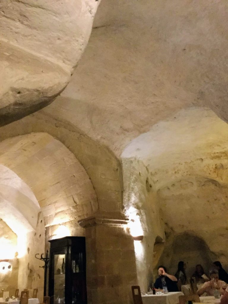 Interior of the Oi Mari restaurant, clearly showing the caves structure.