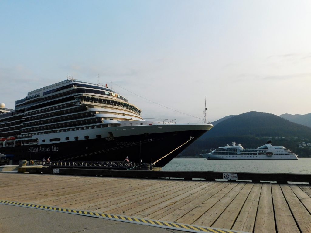 Our cruise ship at the dock in Juneau, mountains in the back ground 