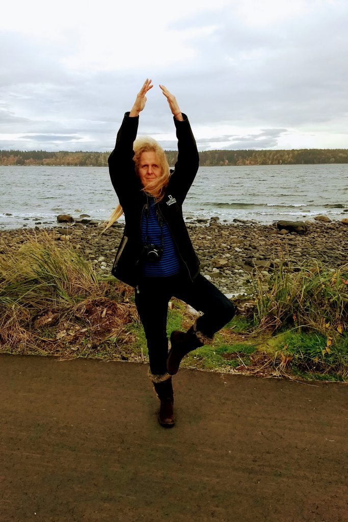 Karen doing a tree pose. Participating in LoveYourBrain Yoga for MS helped her being better balanced. 