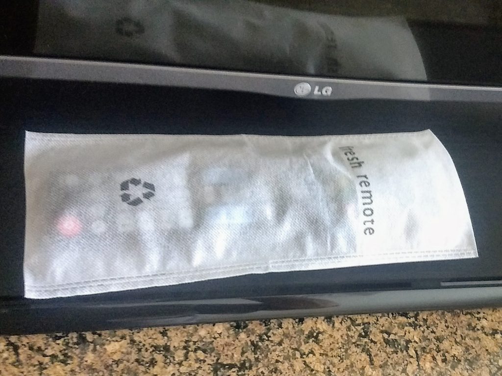 TV remote in "fresh remote" bag at the Hilton in Burlington VT