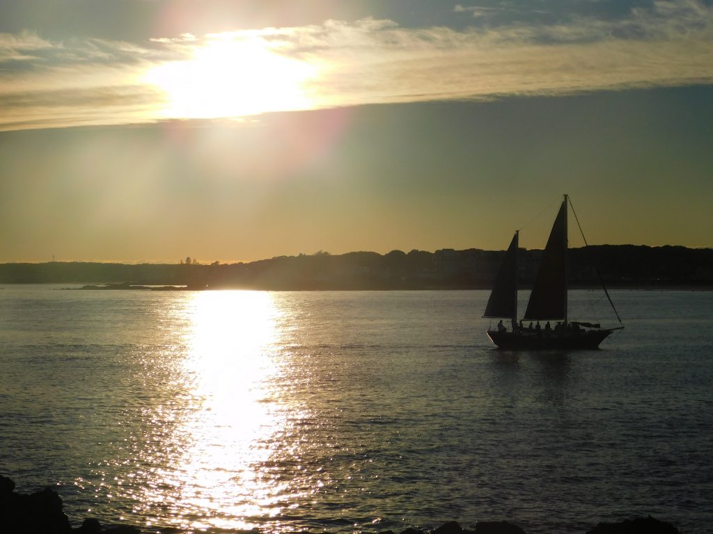 Sail boat on Atlantic Ocean at sunset. Part of our 2020 hindsight.