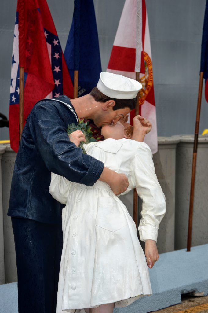 USS Missouri Sailor kissing his sweetheart