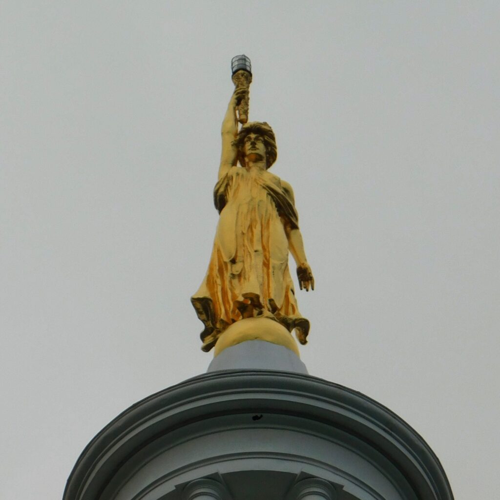 Lady of Wisdom on top of the Maine State House in Augusta