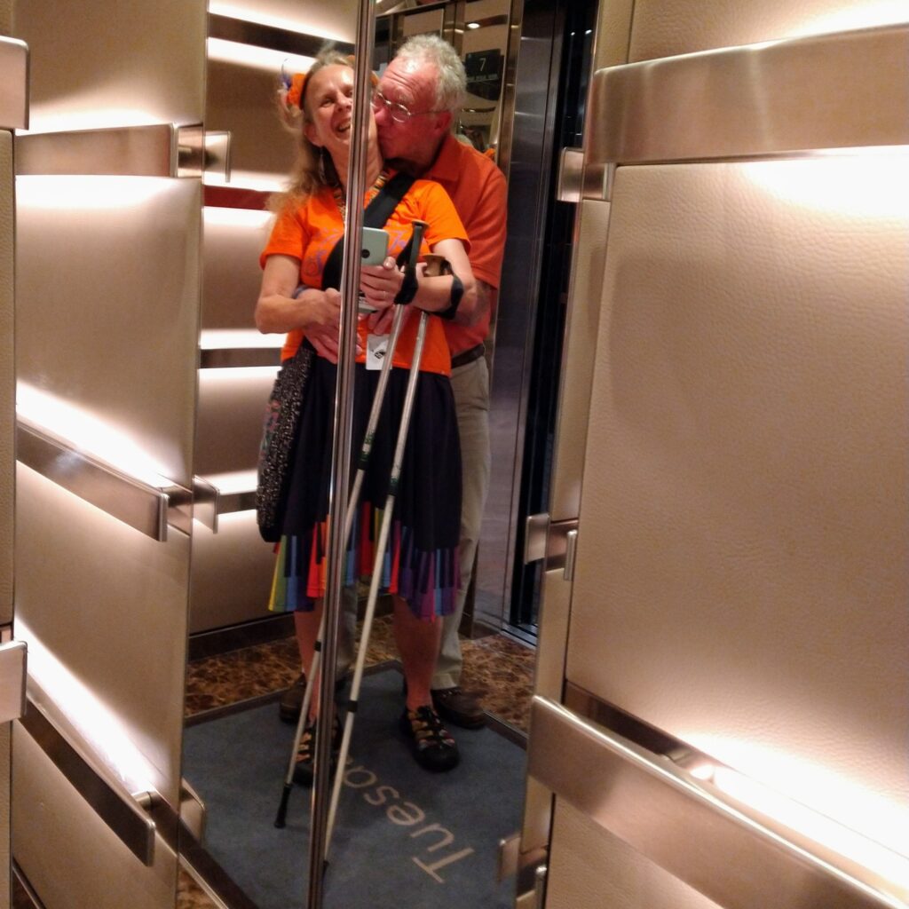 Ready for Orange Party on the MS Rotterdam (mirror selfie by OurCarpeDiem in elevator)